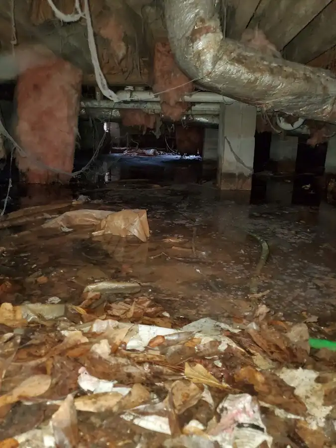 Crawl space flood assessment for Commercial Water Damage Restoration in Merrimack
